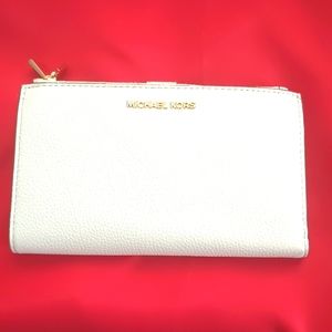 Michael kors iPhone wallet used